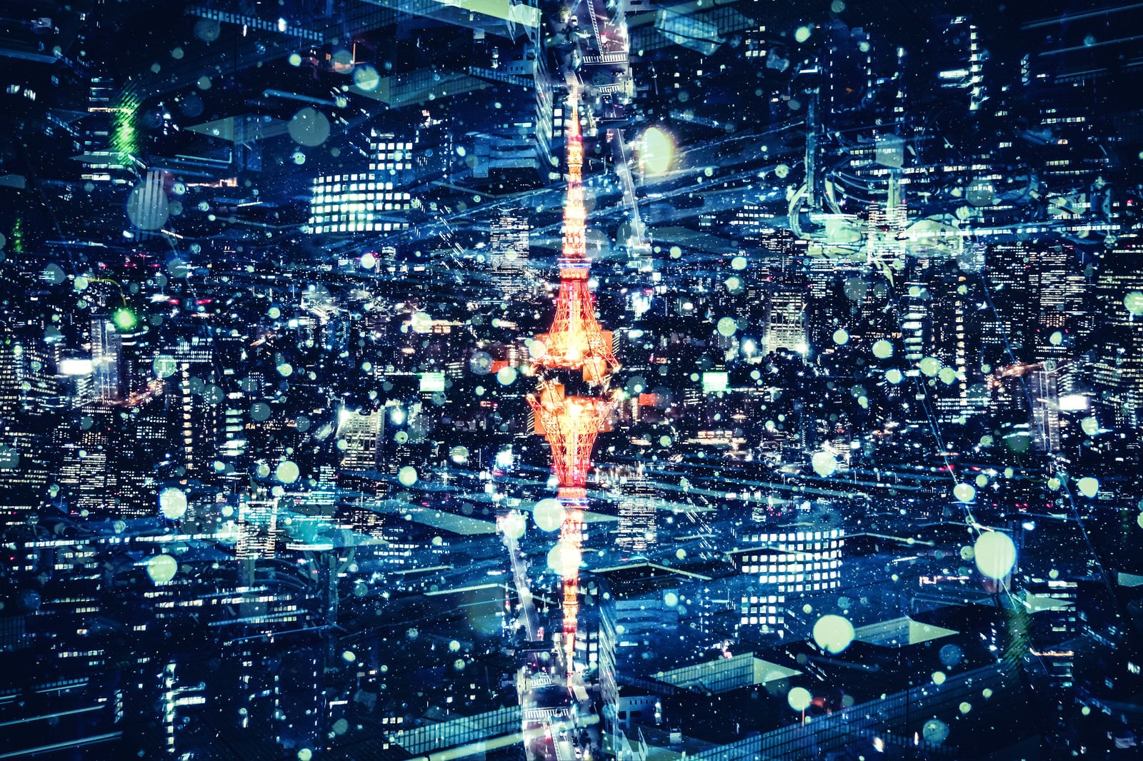 「東京タワーと都市夜景（フォトモンタージュ）」の写真