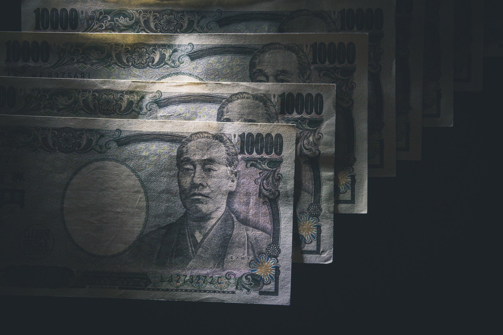 「壱万円札の行方」の写真