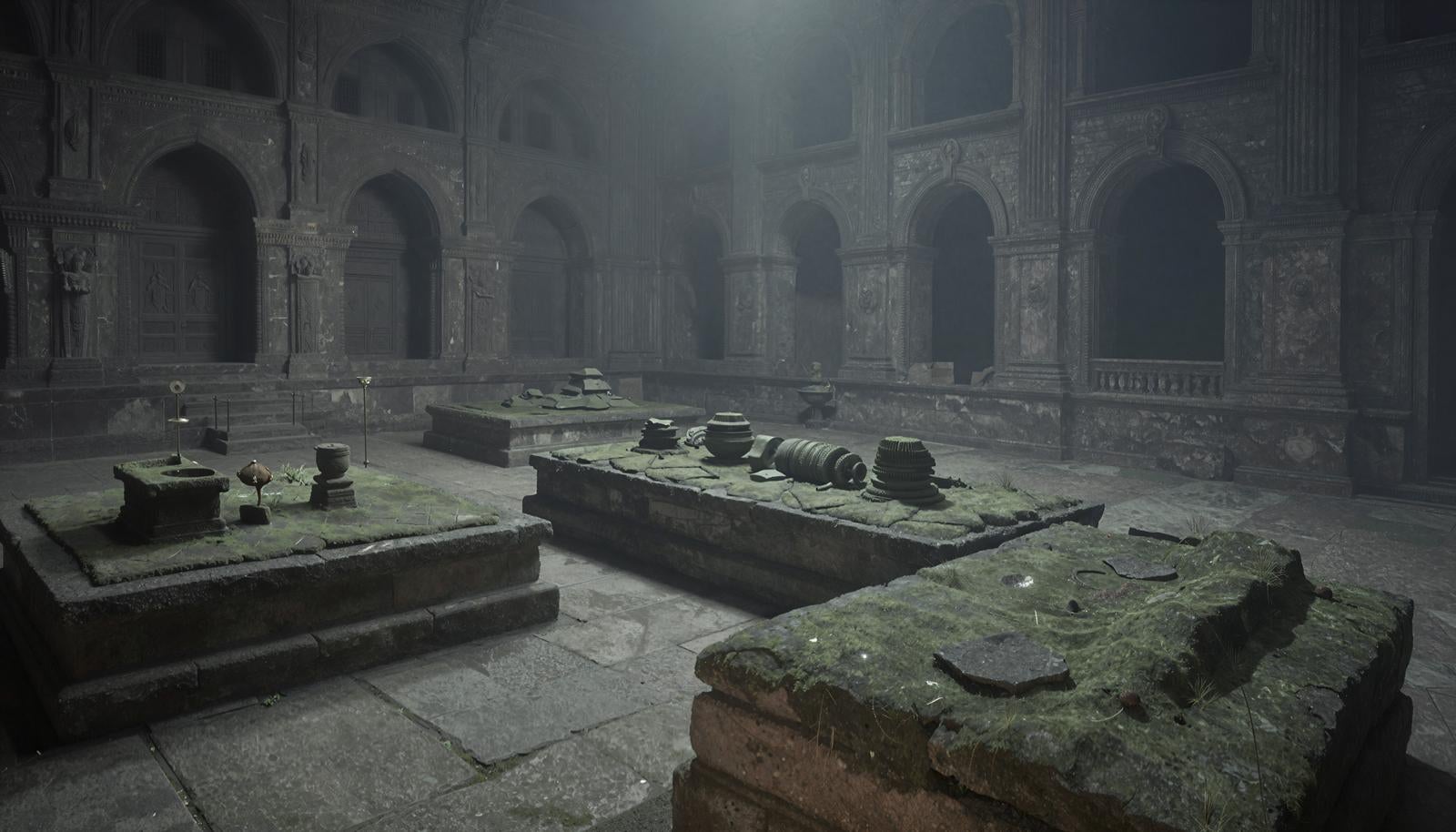 苔が付着した石造遺物が床に散らばるダンジョン風の地下遺跡