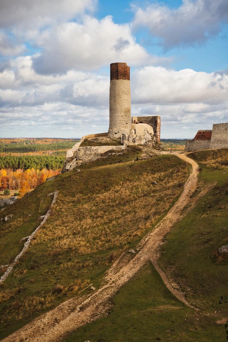 The tower of an old castle and autumn hill landscape in Chęstochowa, Poland