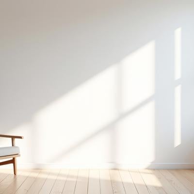 木製フレーム・グレーファブリックシートの北欧風アームチェアの写真