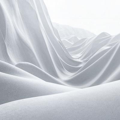 陰影を帯びたドレープ状の光沢布地の写真