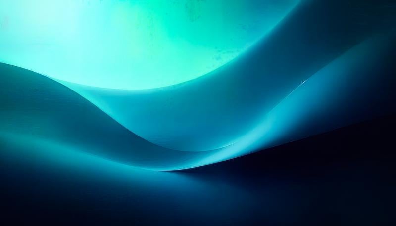 青緑のグラデーションが流れる抽象的な波の写真