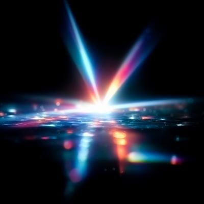 漆黒に映えるレンズフレアの写真