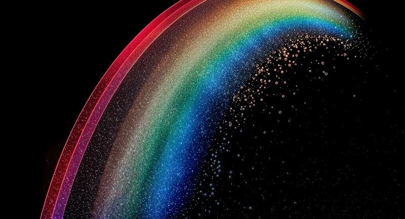 粒子で描いた七色のレインボーの写真