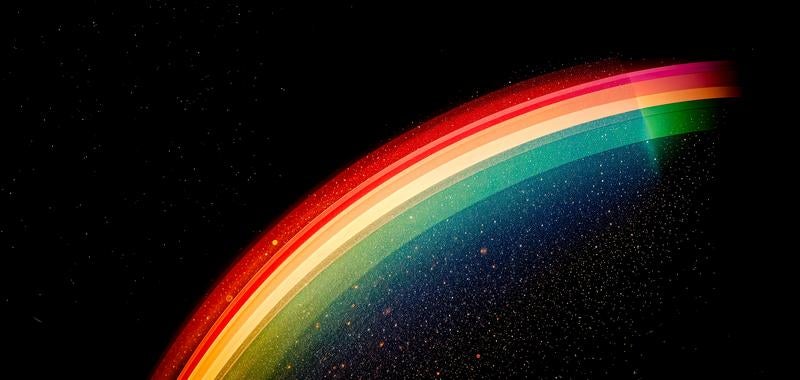 宇宙空間に浮かぶ虹のアーチの写真