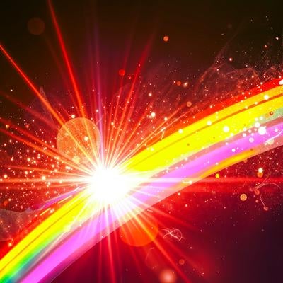 虹と光芒が放射する宇宙風エフェクトの写真