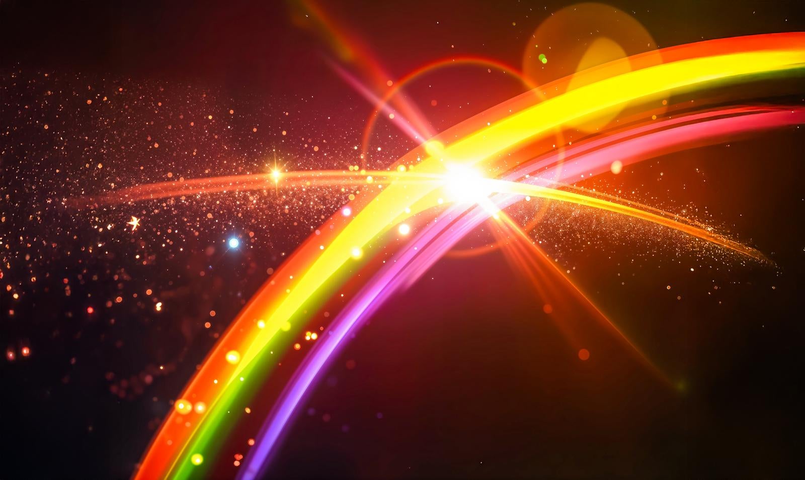 暗い背景に虹色の光跡が2本交差し、交差点から強く発光するCGエフェクト