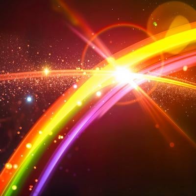 虹色の光跡が交差する瞬間の写真