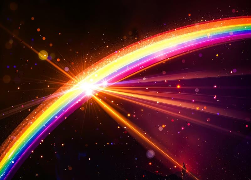 暗闇を走る虹と光芒