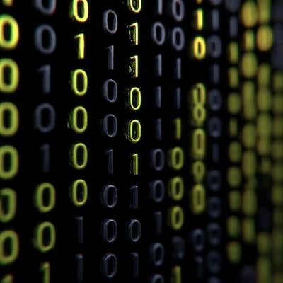 黒背景に浮かぶ0と1のビット列の素材