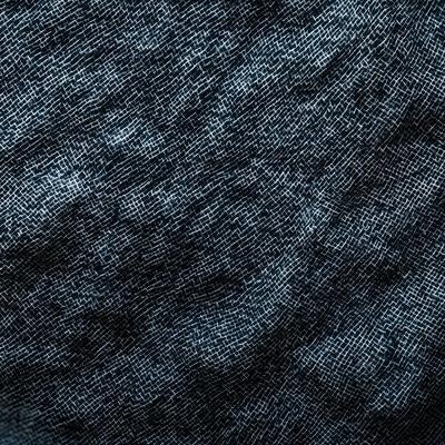インディゴブルーのデニム生地織り目クローズアップの写真