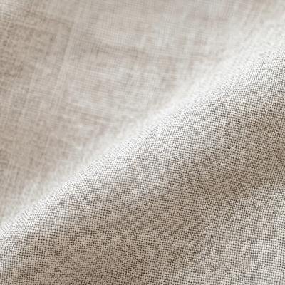 ナチュラルベージュの綿麻風織り目テクスチャーの写真