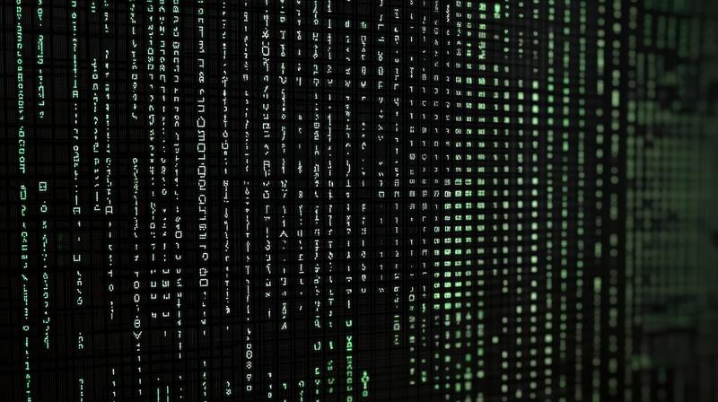 緑色の文字が流れるマトリックス風の写真