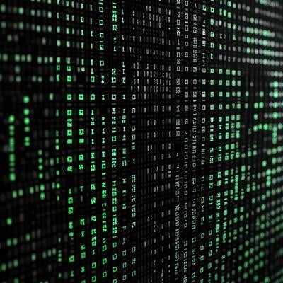 緑色のバイナリコードが流れるデジタルマトリックス画面の写真