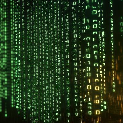 緑とオレンジのバイナリコードが流れる暗い画面の写真