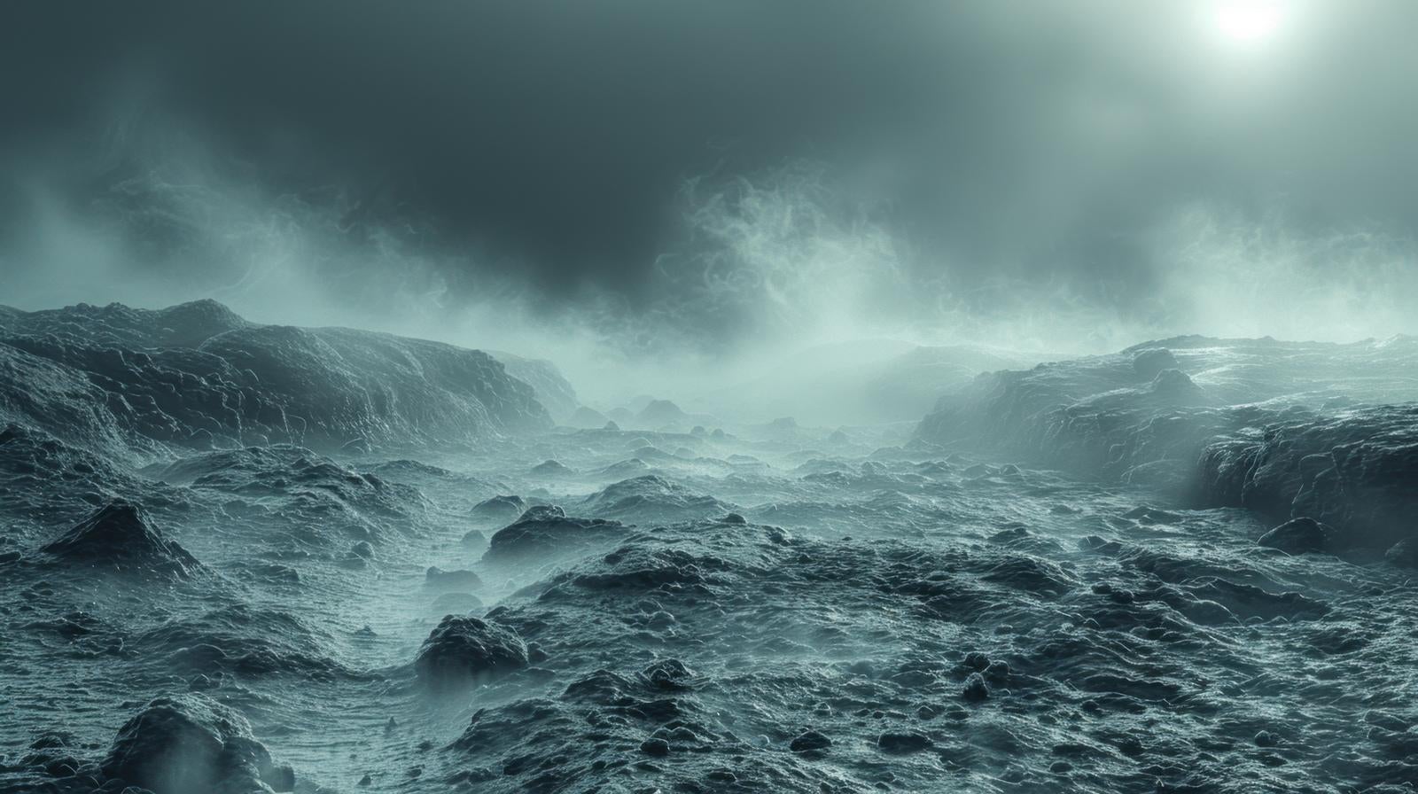 「霧に包まれた岩だらけの荒涼とした風景」の写真