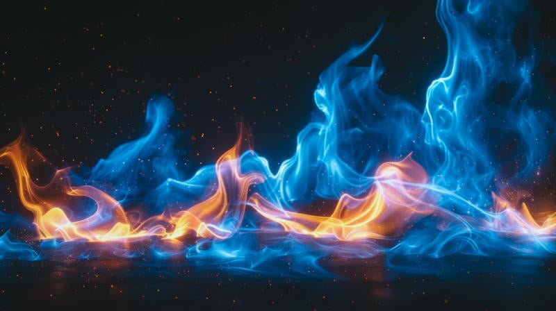 青い炎とオレンジ色の炎が混ざるの写真