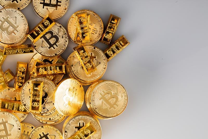 ビットコインとゴールドであふれるの写真