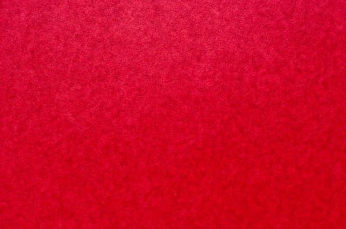 赤い紙のテクスチャーの写真