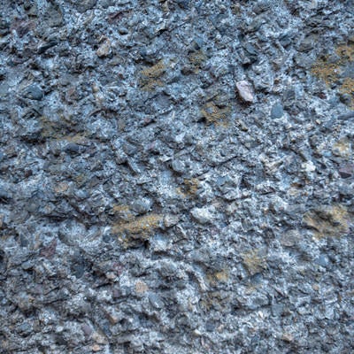 土が残るコンクリート壁（テクスチャ）の写真