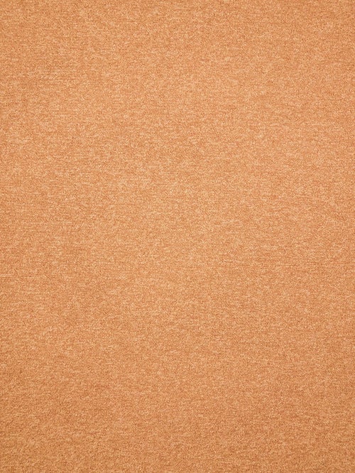 オレンジのタイルカーペット（テクスチャー）の写真