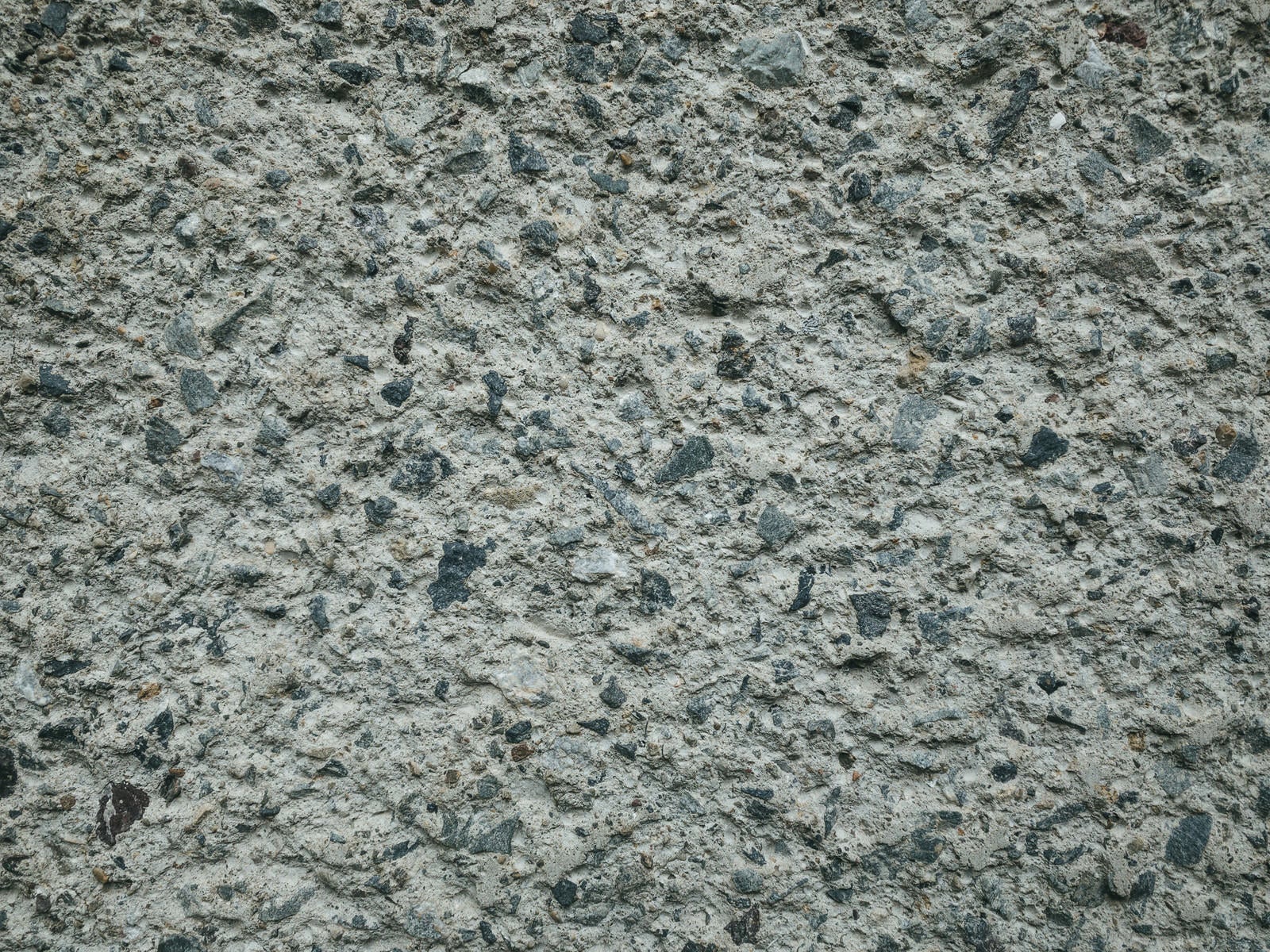 「砂利の詰まったコンクリート（テクスチャー）」の写真