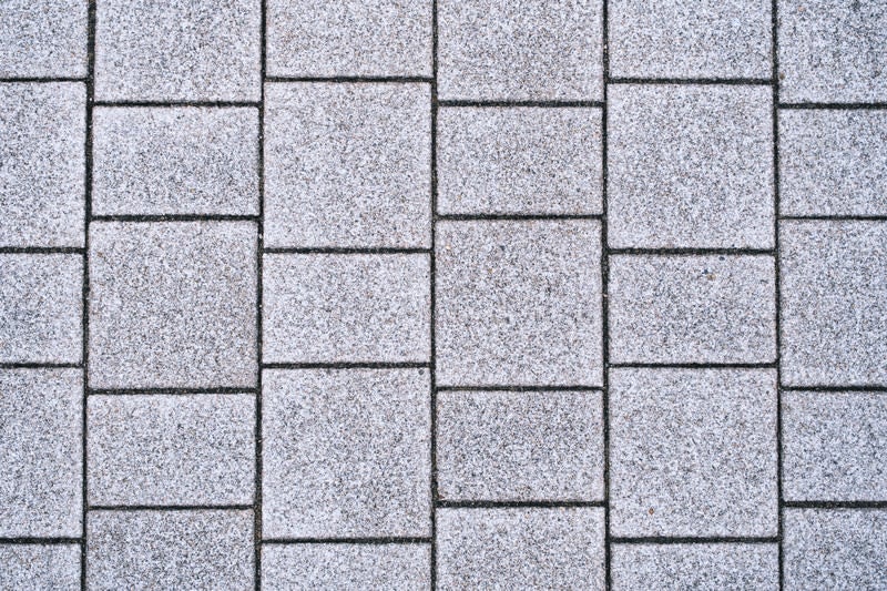 規則的に並ぶ石材タイル（テクスチャ）の写真