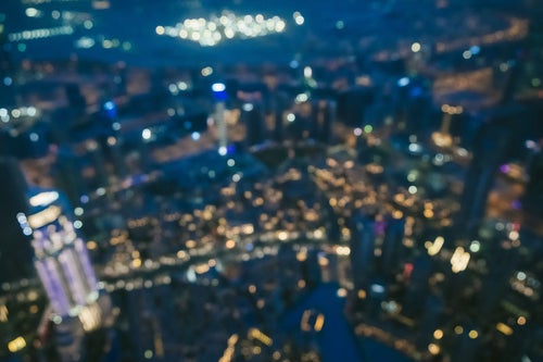 高層ビルからのドバイの夜景（ボケ）の写真