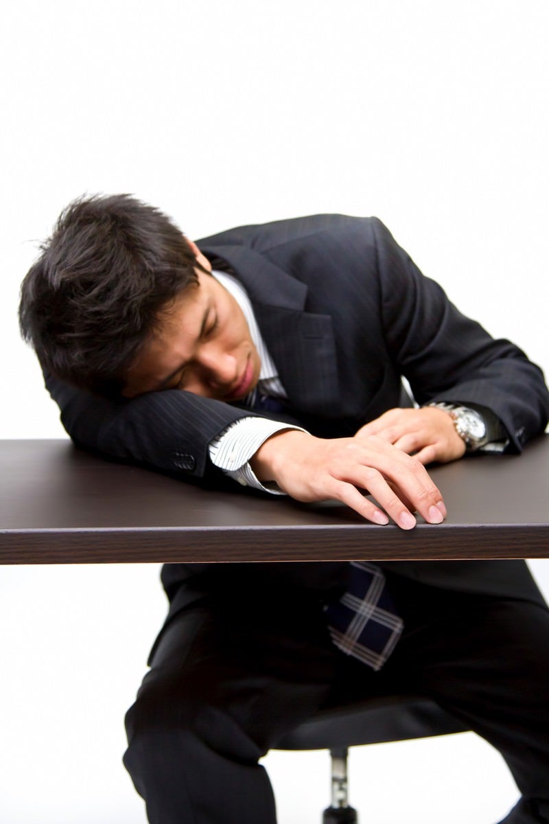 就職活動に疲れた男性の写真