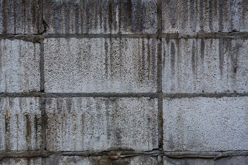 汚れたブロック塀（テクスチャー）の写真