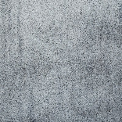 シミの付いたコンクリート壁（テクスチャー）の写真