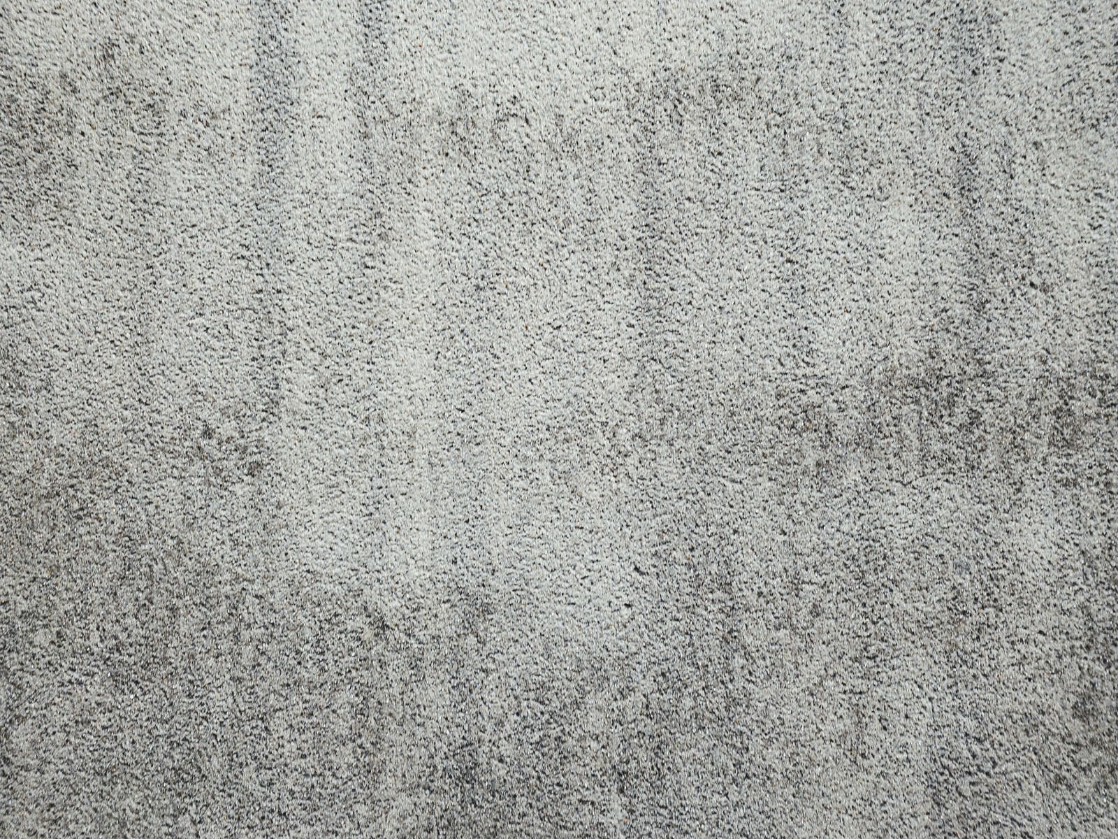 「斑に付いたシミのコンクリート壁（テクスチャー）」の写真