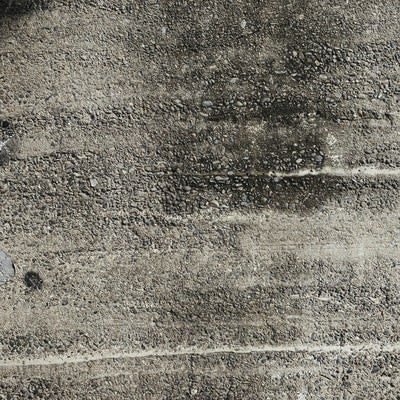 シミ残る砂利コンクリート（テクスチャー）の写真