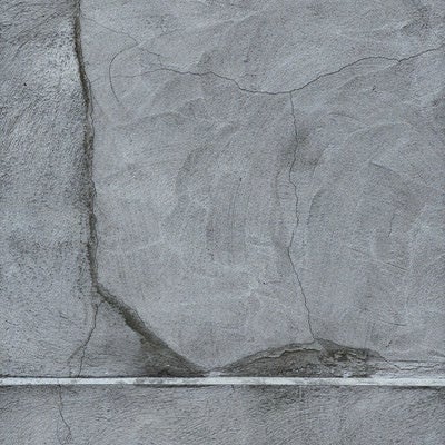コンクリートの表面に入るヒビ（テクスチャー）の写真