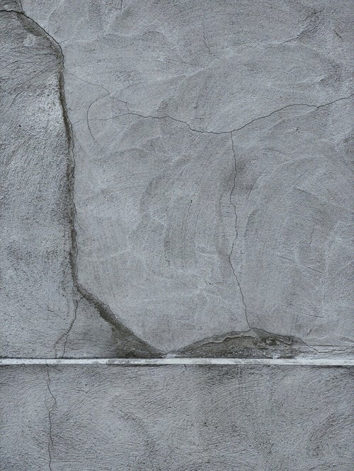 コンクリートの表面に入るヒビ（テクスチャー）の写真
