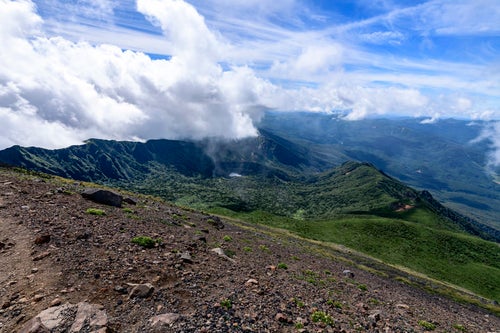 雲を纏う岩手山鬼ヶ城コース方面の写真