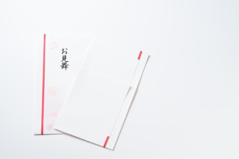 お見舞い用のし袋と封筒の表裏セットの写真