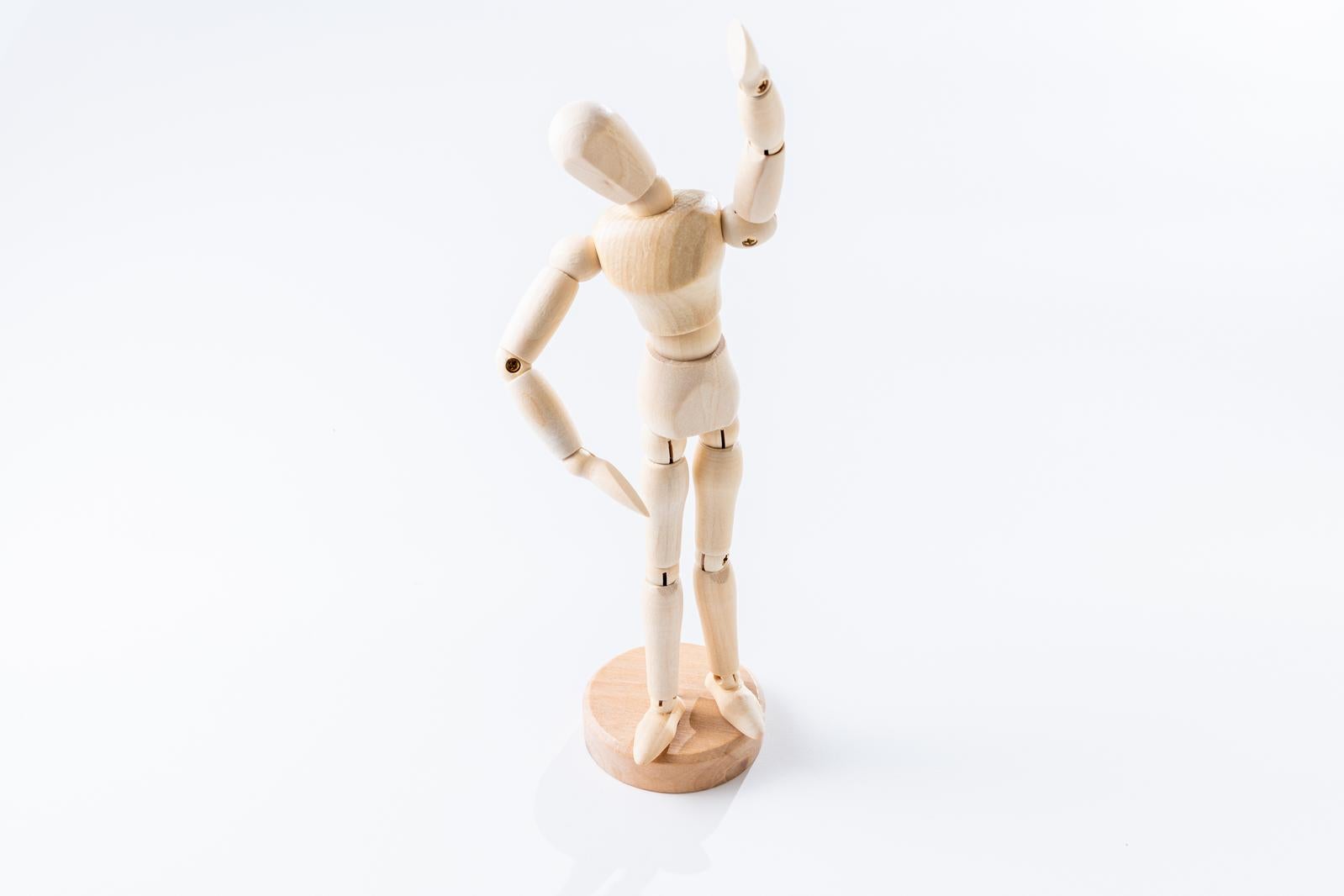 Wooden Posable Mannequin with Raised Arms - free stock photo