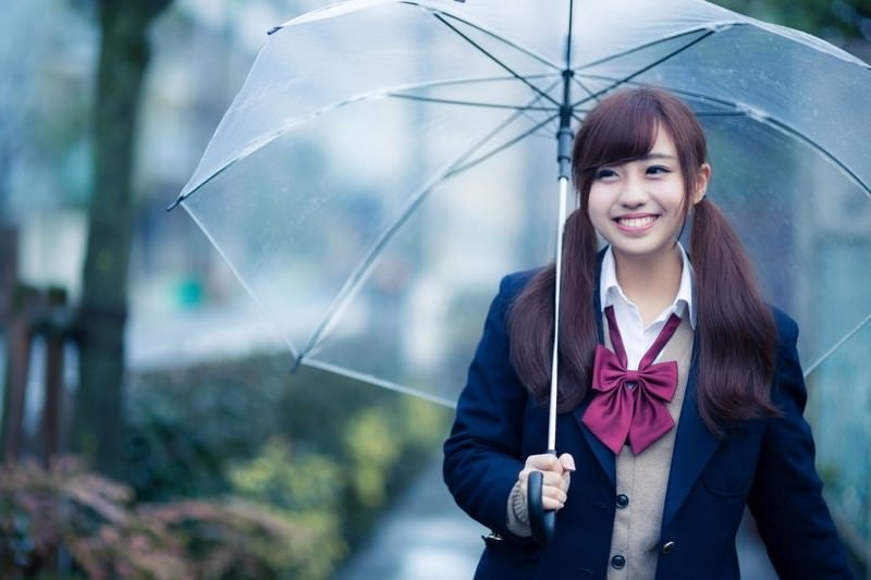 傘を持ってるんそわしちゃう女子高生の写真