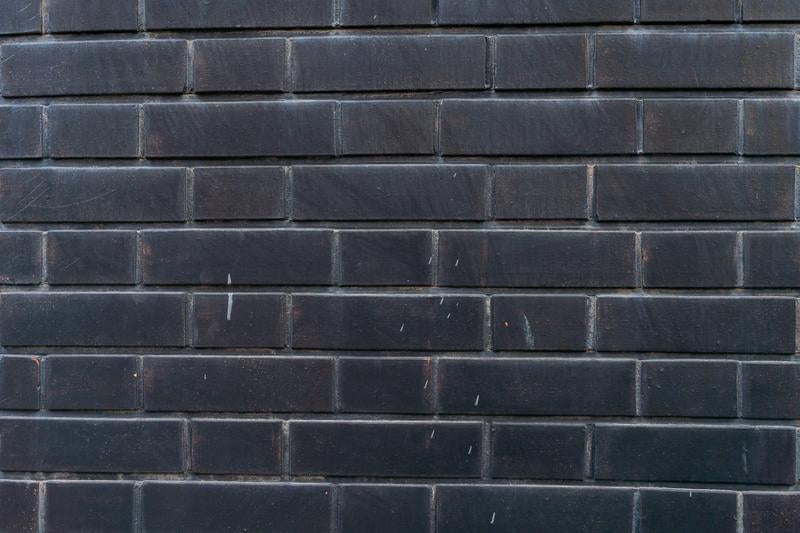 黒いレンガの壁の写真