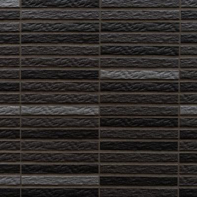 黒とグレーの濃淡があるレンガ調外壁の写真