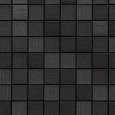 縞模様が規則的に配置された黒いタイルパターンの写真