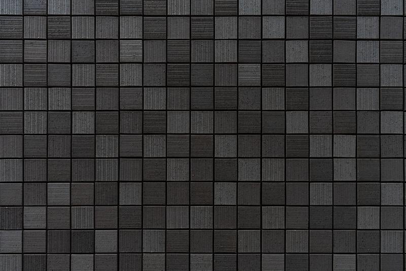 グレーの正方形モザイクタイル背景の写真