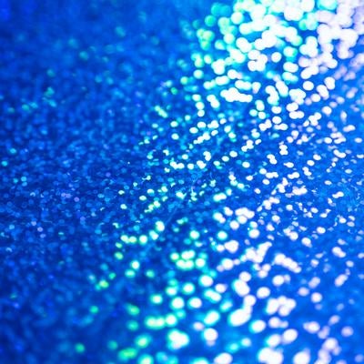 青色基調のキラキラしたボケ効果の写真
