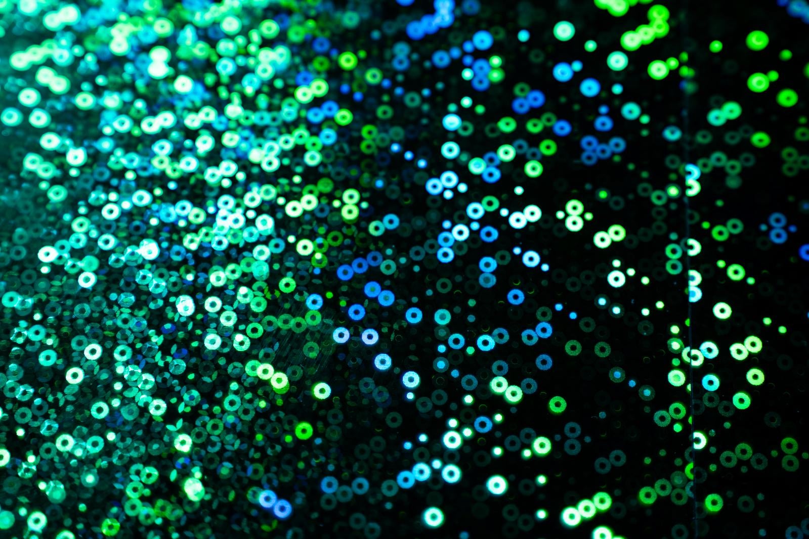 「キラキラ光る円形粒子背景」の写真