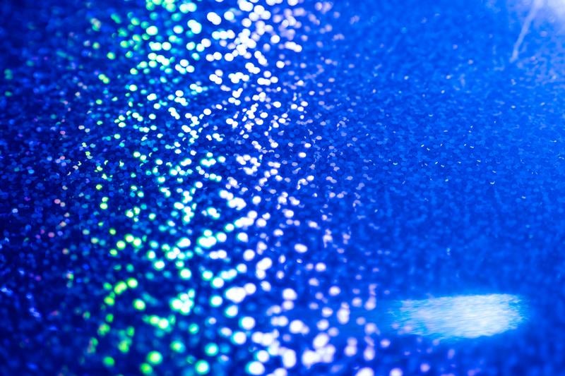 青いボケ光の背景の写真