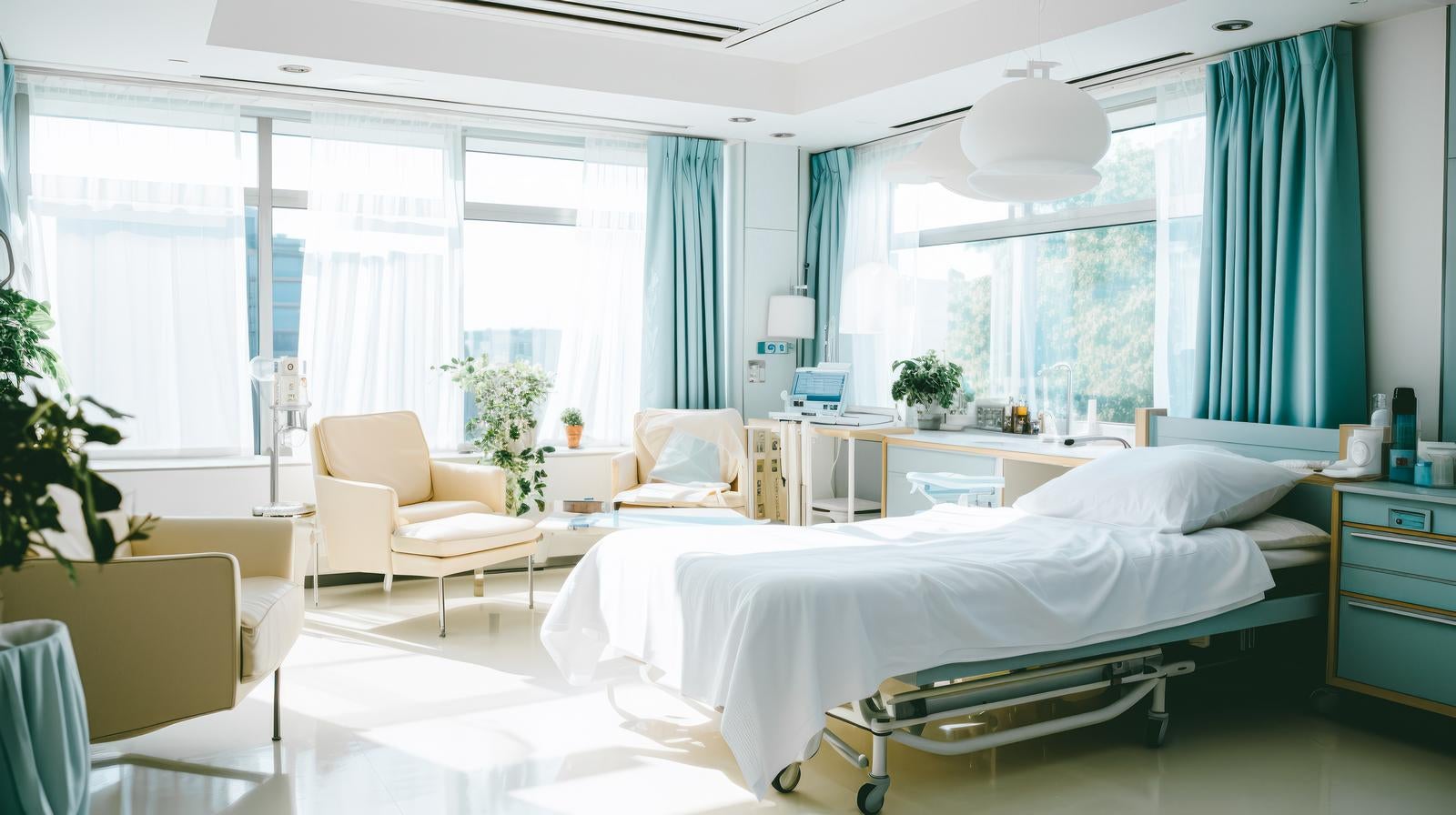 「自然光の入る病院の病室」の写真