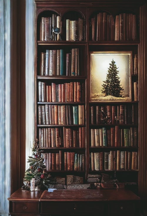 書斎の本棚に飾られたクリスマスツリーの絵の写真