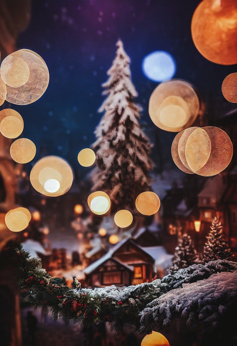 ライトアップのボケとクリスマスツリーの写真